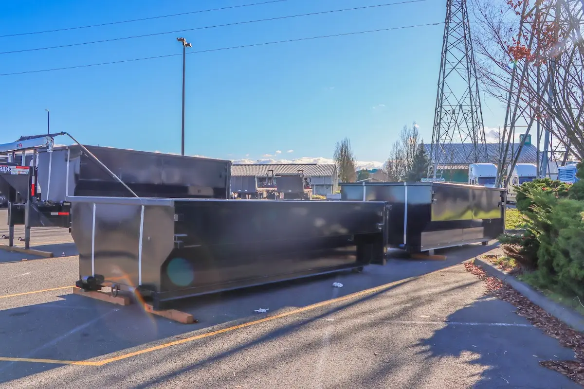 Roll-off dumpster ready for waste disposal at job site for Roofing Dumpster Rental in Henryetta
